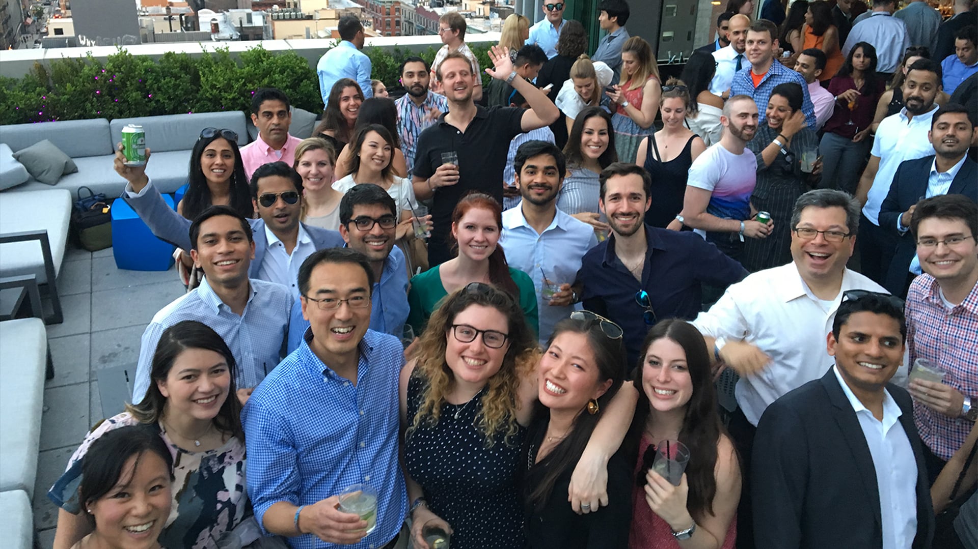 A group of Deloitte Digital employees celebrating
